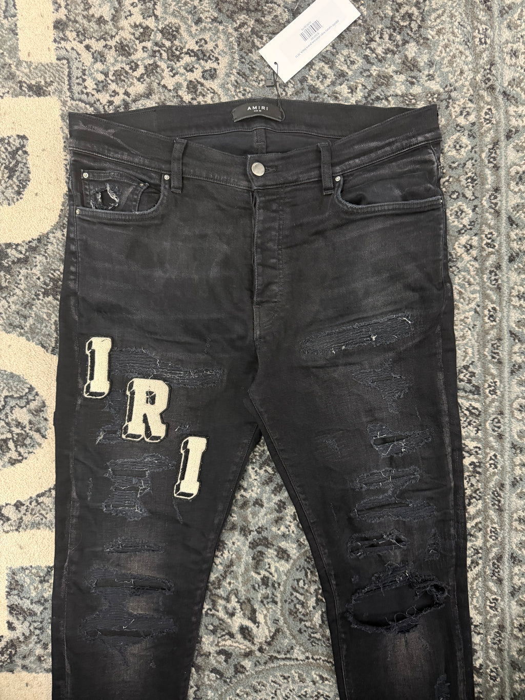 AMIRI varsity logo applique jeans black 36 U