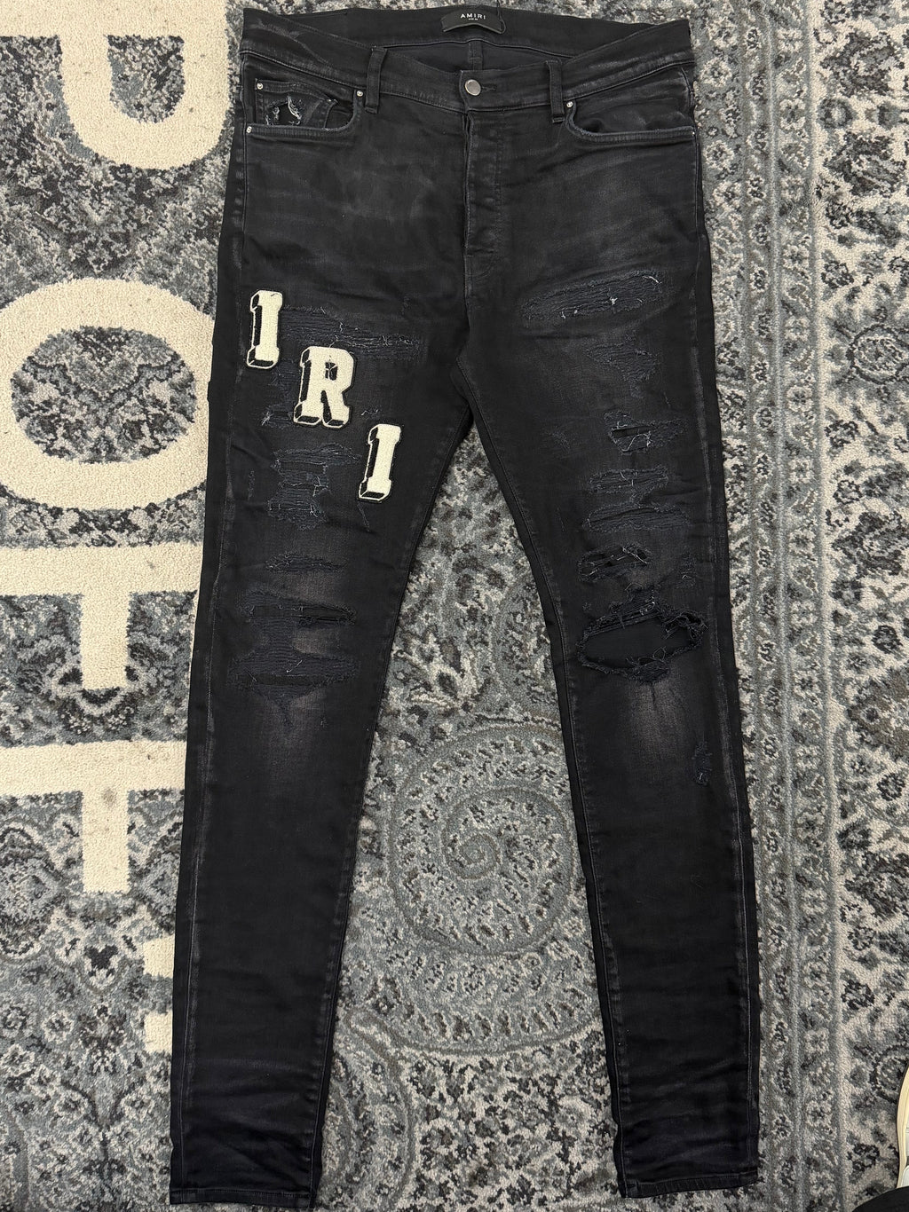 AMIRI varsity logo applique jeans black 36 U