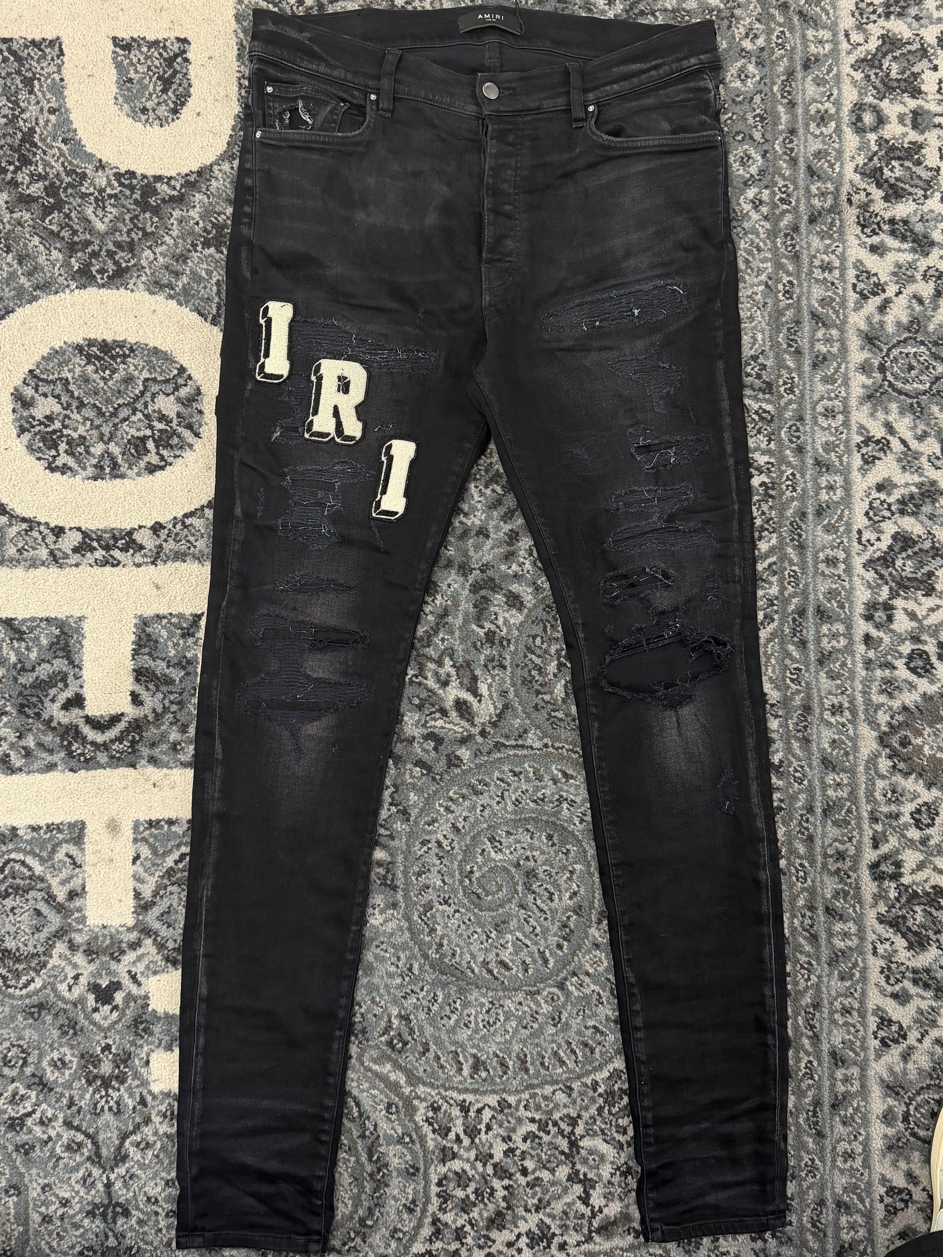 AMIRI varsity logo applique jeans black 36 U
